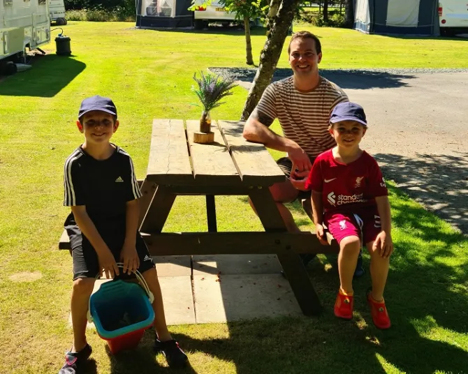 Riverbend family on bench