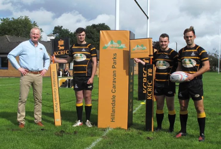 Players and Denis presenting the brand new KCRFC flags and posts sponsored by Hillandale.